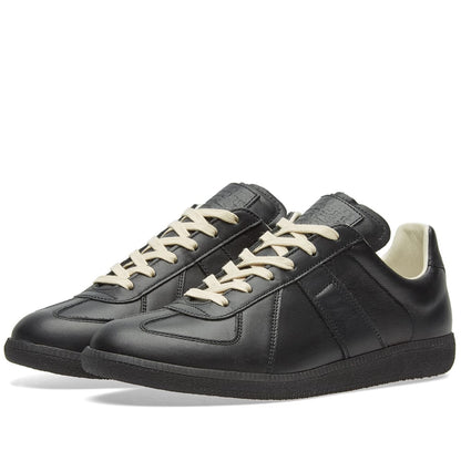 Maison Margiela Women's Black Leather Sneakers — front three quarter pair