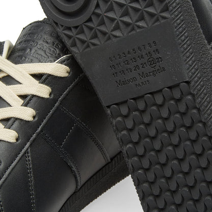 Maison Margiela Women's Black Leather Sneakers — outsole detail