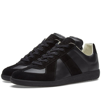 Maison Margiela Women's Black Leather & Suede Sneakers – Beige Interior — front three quarter pair