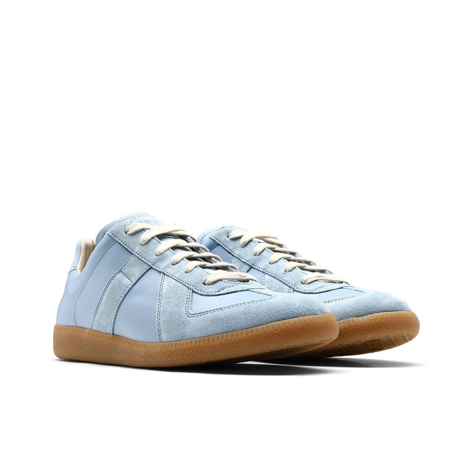 Maison Margiela Women's Light Blue Leather & Suede Sneakers — front three quarter pair